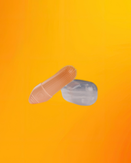 An orange silicone finger brush with a textured, raised grip on one end, shown next to its clear plastic storage case against a vibrant orange-to-yellow gradient background.
